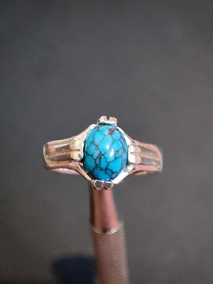 turquoise-silver-ring-with-four-prongs-13369.webp